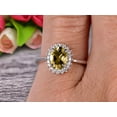thumbnail image 4 of 1.50 Carat 8x6mm Oval Cut Champagne Diamond Moissanite Engagement Ring With 10k White Gold Halo Flower Prong Set, 4 of 5