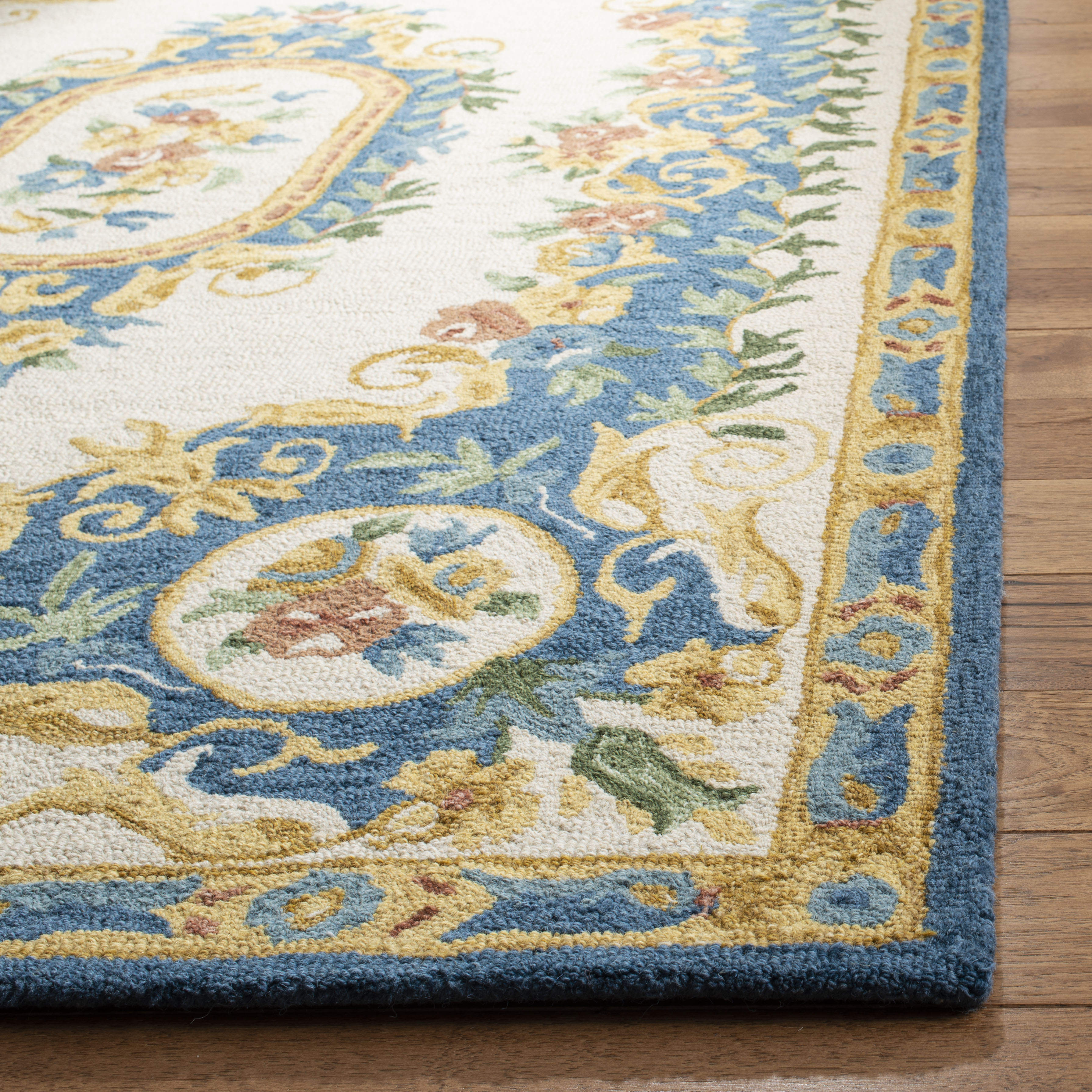 SAFAVIEH Micro-Loop Ibrahim Floral Bordered Wool Area Rug, Cream/Blue, 5' x 5' Square