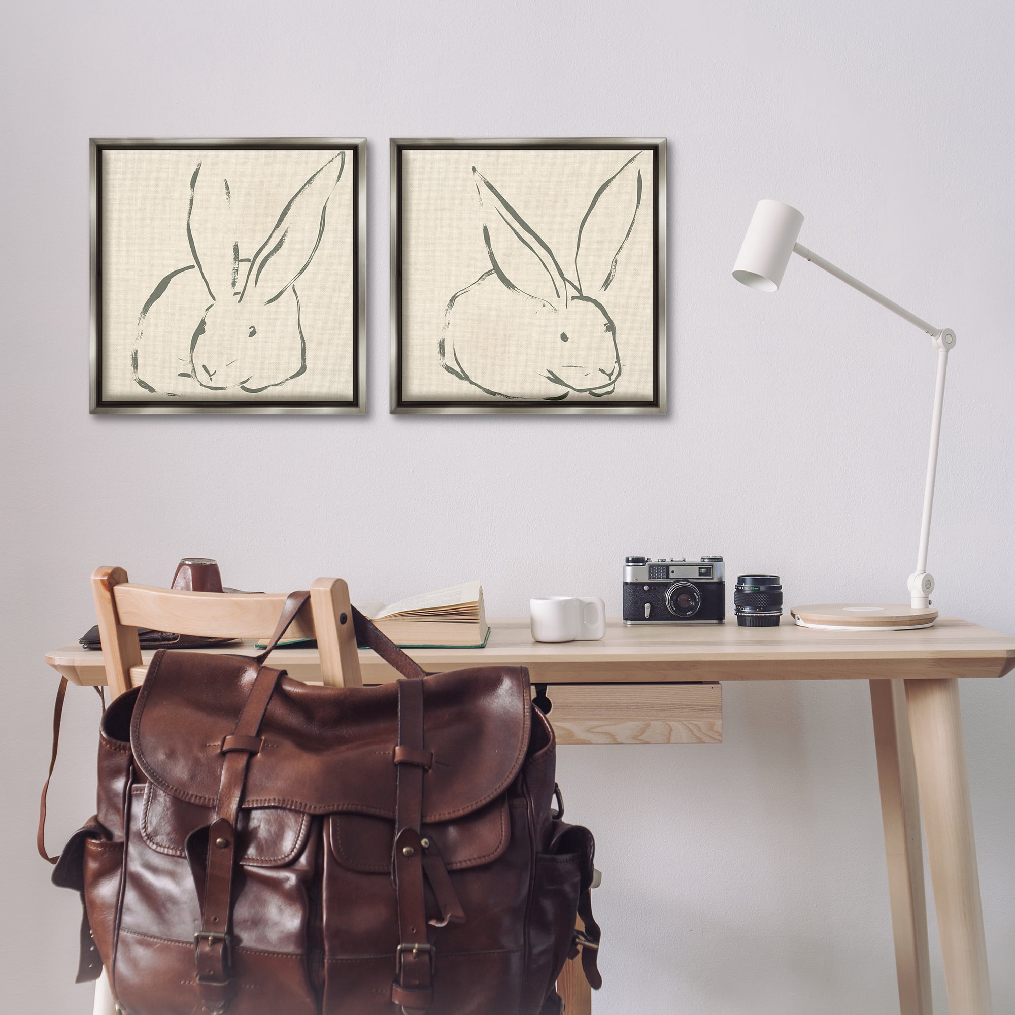 Stupell Industries Minimalist Resting Rabbit Line Drawing Animals Drawing Gray Floater Framed Canvas Art Print Wall Art, 18 x 18, Set of 2