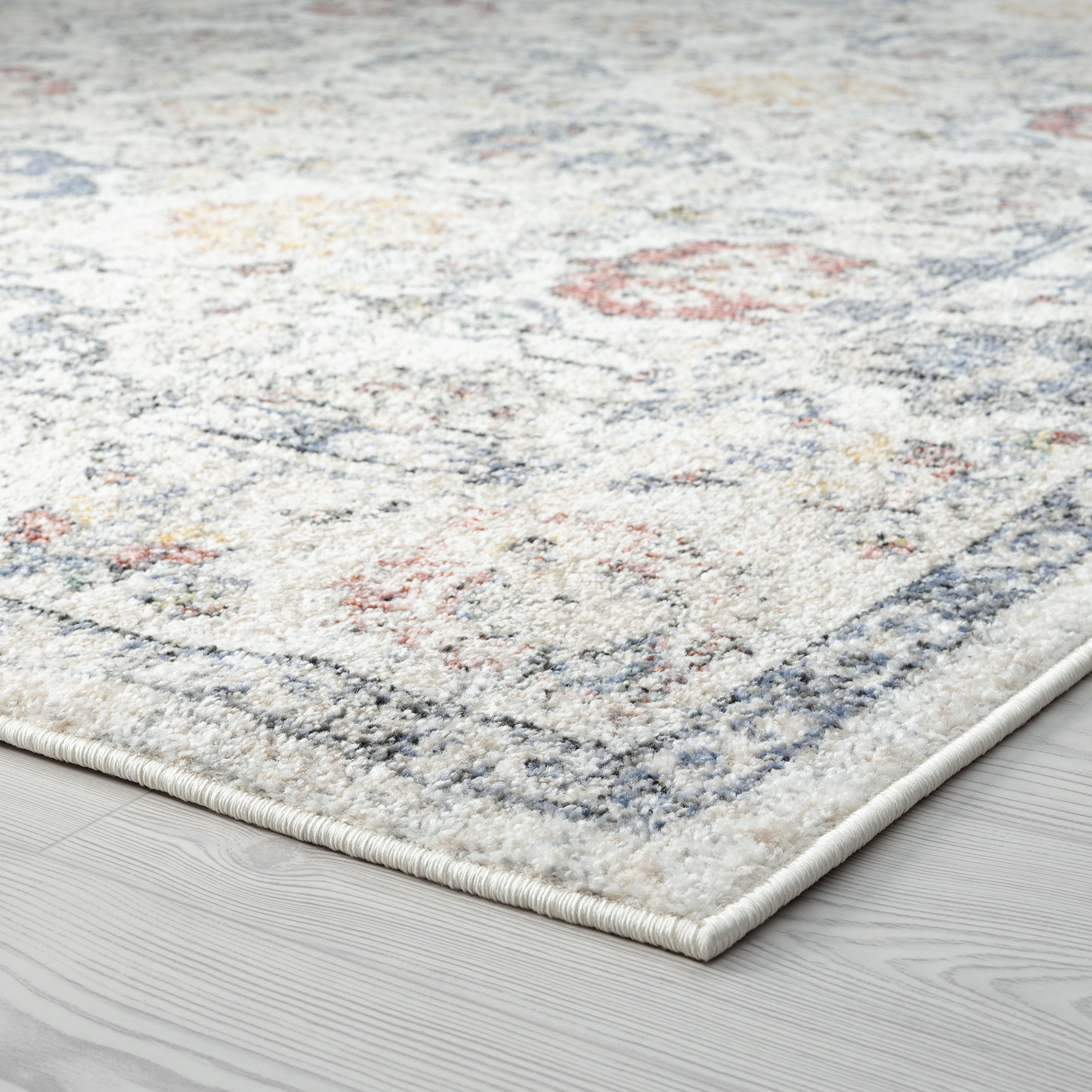 Addison Traditional 5' x 7' Cream and Blue Polypropylene Indoor Area Rug
