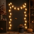 thumbnail image 3 of Halloween Ghost String Lights,Warm White LED Ghost Garland for Indoor Wall Window Fireplace Hanging,Spooky Halloween Party Holiday Decorative Lighting, 3 of 8
