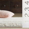 thumbnail image 5 of SAFAVIEH Penelope Marcelyn Solid Shag Area Rug, Ivory, 9' x 12', 5 of 8