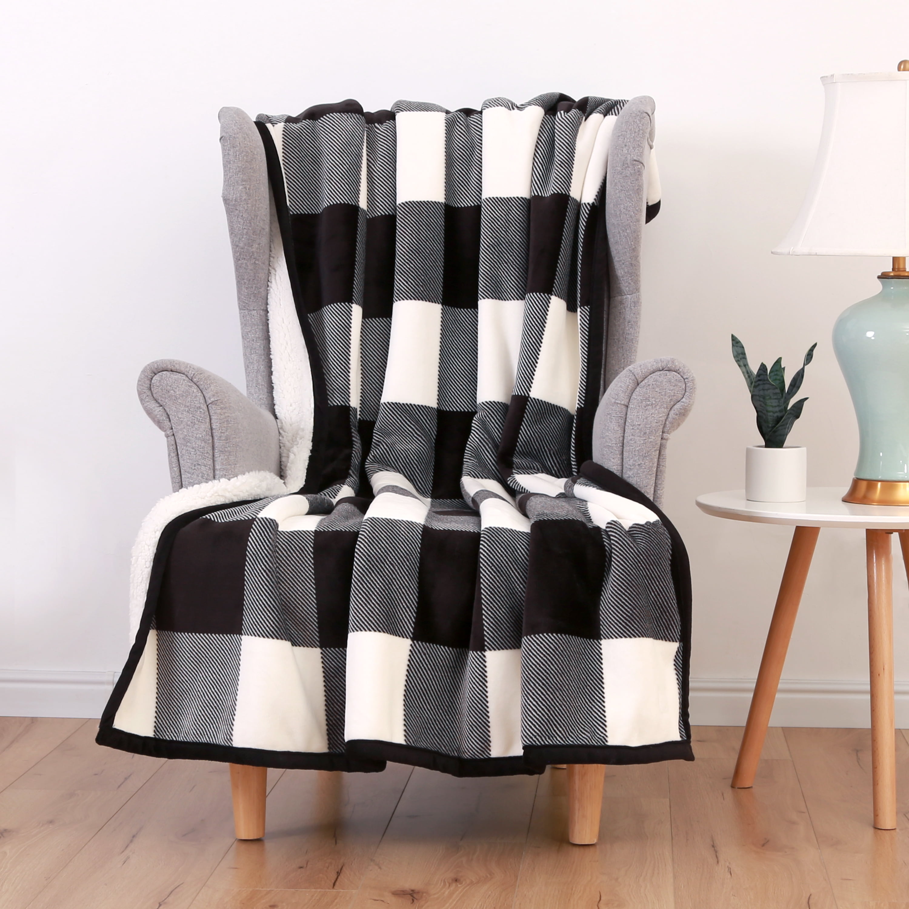 Better Homes Gardens Oversized black and white buffalo plaid Sherpa Throw with matching black velvety binding measures 50 x 60