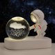 thumbnail image 1 of Bola de cristal tallada con luz de noche con forma de astronauta y base luminosa para estudiantes y amigos, 1 of 6