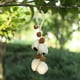thumbnail image 2 of Campanas de Viento Al Aire Libre, Cuerda Natural Hecha a Mano de Campanas de Mano E Instrumentos de Acompañamiento, Melodías Calmantes de Conchas de Fruta para el Yoga Y la Relajación, 2 of 2