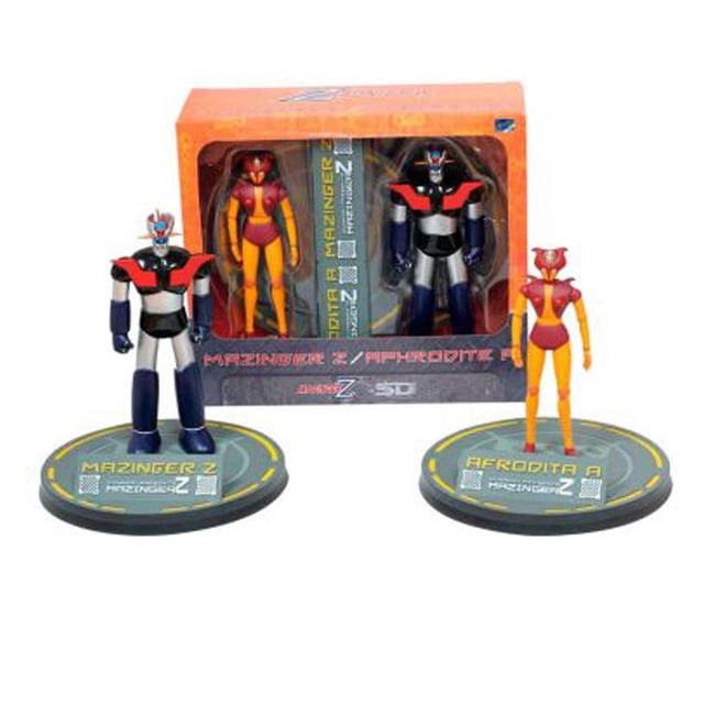 mazinger z y afrodita set de dos figuras 18cm Estatuilla Mazinger Z y Aphrodite, set coleccionable de vinyl con dos figuras de 18 cm sobre bases circulares con nombres impresos, vistas frontales con la caja naranja al fondo; adecuado para exhibición en colección o dioramas.