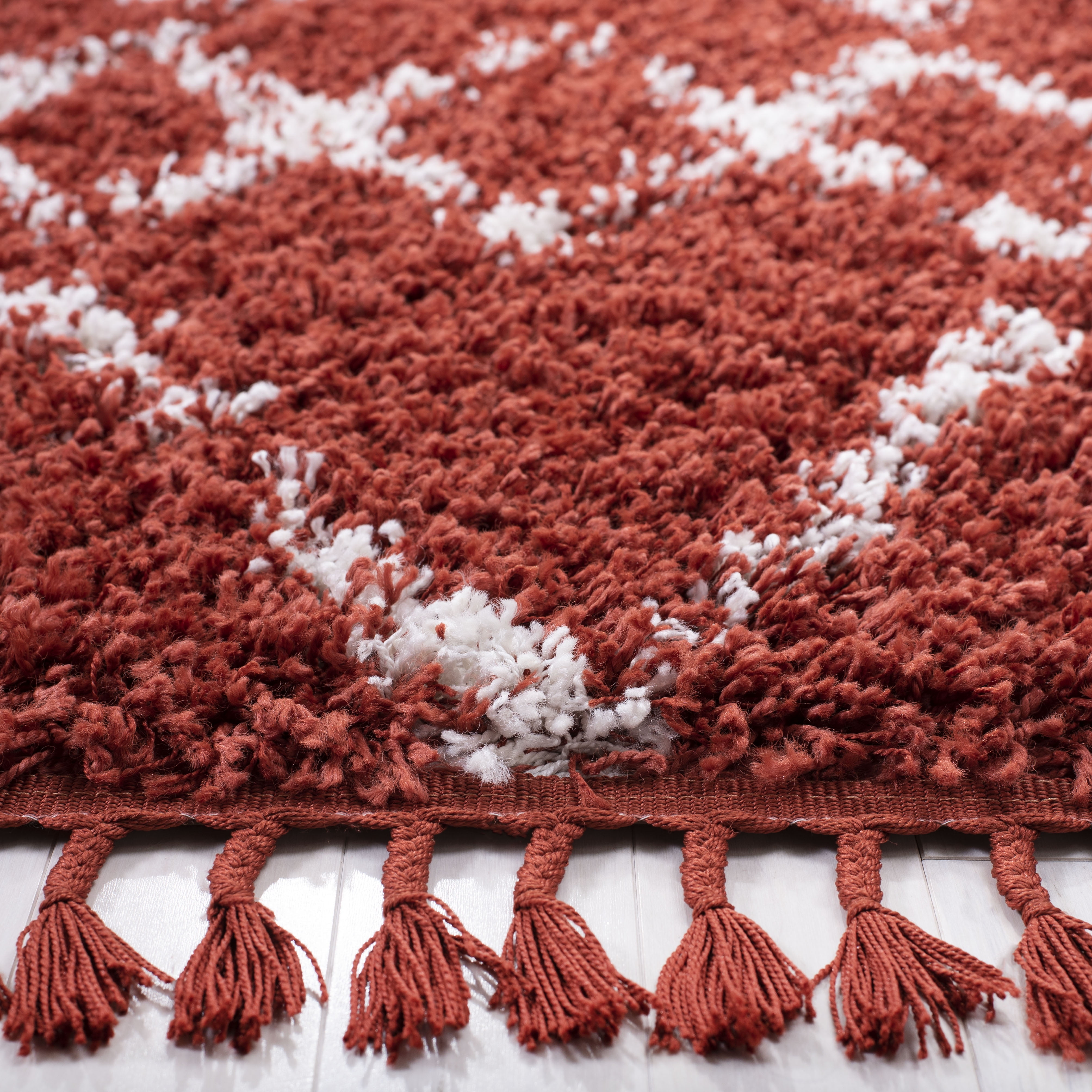 SAFAVIEH Pro Lux Marcus Aztec Fringe Shag Runner Rug, Rust/Cream, 2' x 8'
