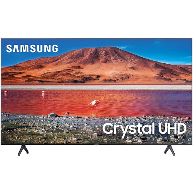 pantalla samsung tu700 43 smart tv uhd hdmi un43tu7000fxzx 43" Crystal UHD, vista frontal centrada de la TV en negro con patas en V y diseño sin bordes aparente; pantalla muestra paisaje de montaña y lago con colores amplios; resolución 3,840 x 2,160 y procesador Crystal 4K; suele usarse también como monitor multimedia en espacios compactos.