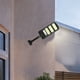 thumbnail image 1 of Luces solares con sensor de movimiento para exteriores - 213 LED de seguridad con detección de movimiento para jardín, patio, terraza y caminos | Resistentes a la intemperie IP65 | Soporte ajustable, 1 of 5