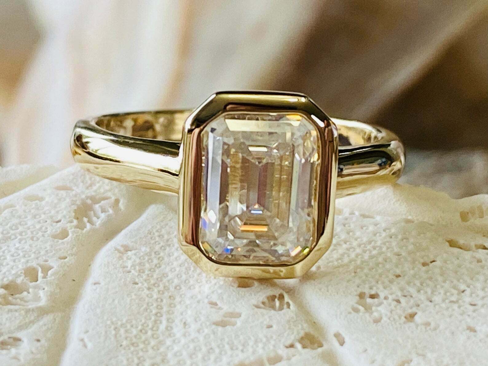 HeartsAndYou 2ct Engagement Ring for Women Emerald Cut Moissanite Bezel Set Solitaire 18k Yellow Gold over Silver