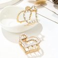 thumbnail image 4 of Set de 2 horquillas blancas antideslizantes para mujer y niña ER, 4 of 5