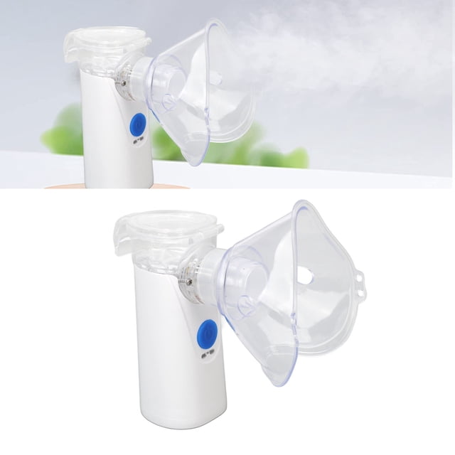 máquina nebulizadora de mano nebulizador portátil de amplia aplicación recargable por usb tecnología ultrasónica dc5v súper silencioso para viajes anggrek otros vista frontal centrada del nebulizador portátil blanco (ABS) con botón azul y mascarilla y boquilla transparentes que emiten niebla fina; especificación indica capacidad 0.5–12 ml y partículas atomizadas ≤5 μm, a menudo usado para hidratar la piel durante viajes.