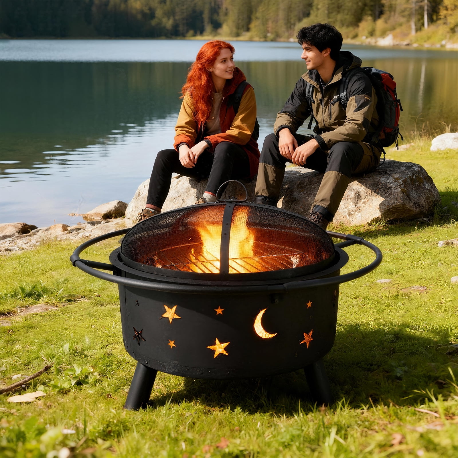 PATIO-IN 24 Inch Outdoor Fire Pit, Star and Moon Cutout Steel Fire Bowl with Mesh Spark Screen, Poker & Grate, Wood Burning Fire Pit for Patio Backyard Camping, Black
