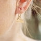 thumbnail image 4 of 100 dijes de aleación para hacer joyas, colgantes y llaveros, ideales para manualidades y electrónica artesanal. Incluyen un dije con el número del año., 4 of 8