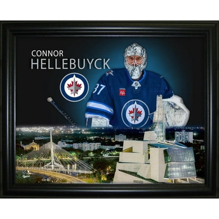 Connor Hellebuyck 16x20 framed skyline print featuring the Winnipeg Jets logo and a cityscape of Winnipeg. The officially licensed NHL wall art is professionally framed with a glass front and expert matting. The multicolour design includes Connor Hellebuyck in a Winnipeg Jets jersey, with the team logo and name prominently displayed. Finished size is 16x20 inches, ideal for home, office, or sports bar decor. Made in Canada by Frameworth, known for premium framing since 1992.