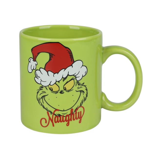 The Grinch Naughty or Nice 16oz Mug by Bioworld, a ceramic coffee mug featuring a vibrant green design with the Grinch wearing a Santa hat. The side shown displays the word 'Naughty' in red script beneath the Grinch's mischievous expression. Officially licensed and microwave-safe, this 16oz mug is perfect for festive drinks and collectors.