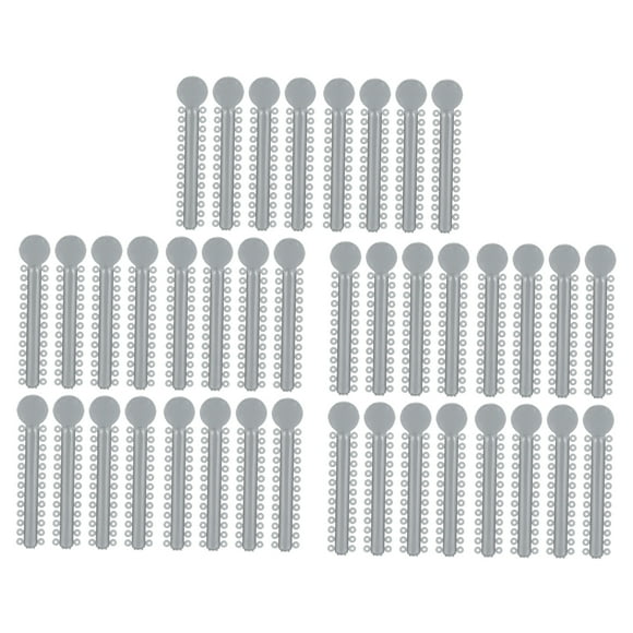 40 ligaduras de ortodoncia de plástico color plateado para ortodoncia dental.