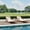 Brown four-line rattan + off-white cushion, variant on 2-Piece Rattan Outdoor Chaise Lounge Chairs - Adjustable 5-Position Patio Recliners with Armrests, Cushions, Pillows & Wheels - Collapsible Poolside, Deck, Backyard Set
