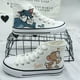 thumbnail image 1 of Primavera y otoño Nuevos zapatos de lona de caña alta para hombres de marca compartida Tom y Jerry Zapatos de pareja de estudiantes versátiles de moda de estilo coreano para mujeres ins, 1 of 4