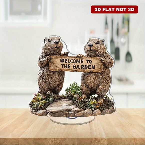Rotating acrylic ornament featuring lifelike groundhogs with a wooden sign welcoming you to the garden surrounded by vibrant stone base and lush plants