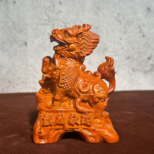 Large pair of ebony carved Qilin figurines, perfect for home decoration, attracting wealth and protecting the home. A feng shui gift made of redwood.