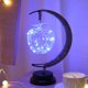 thumbnail image 4 of Lámpara decorativa LED en forma de luna y estrellas con base de hierro, ideal para regalos infantiles y decoración estilo ins. Incluye control remoto y opciones de carga USB o baterías. Disponible en, 4 of 7