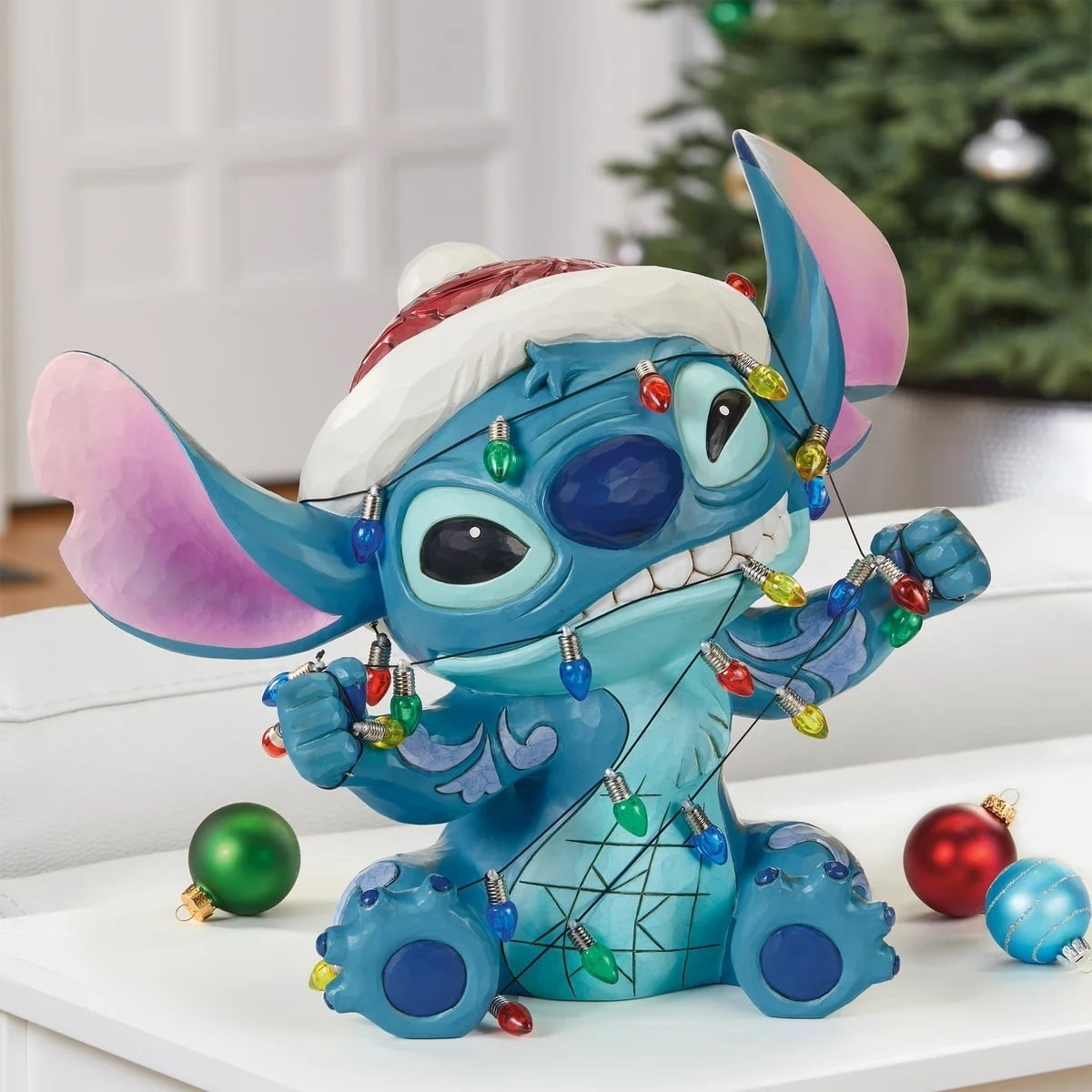 Enesco Disney Showcase Stitch Wrapped in Christmas Lights Enesco Disney Showcase Stitch Wrapped in Christmas Lights
