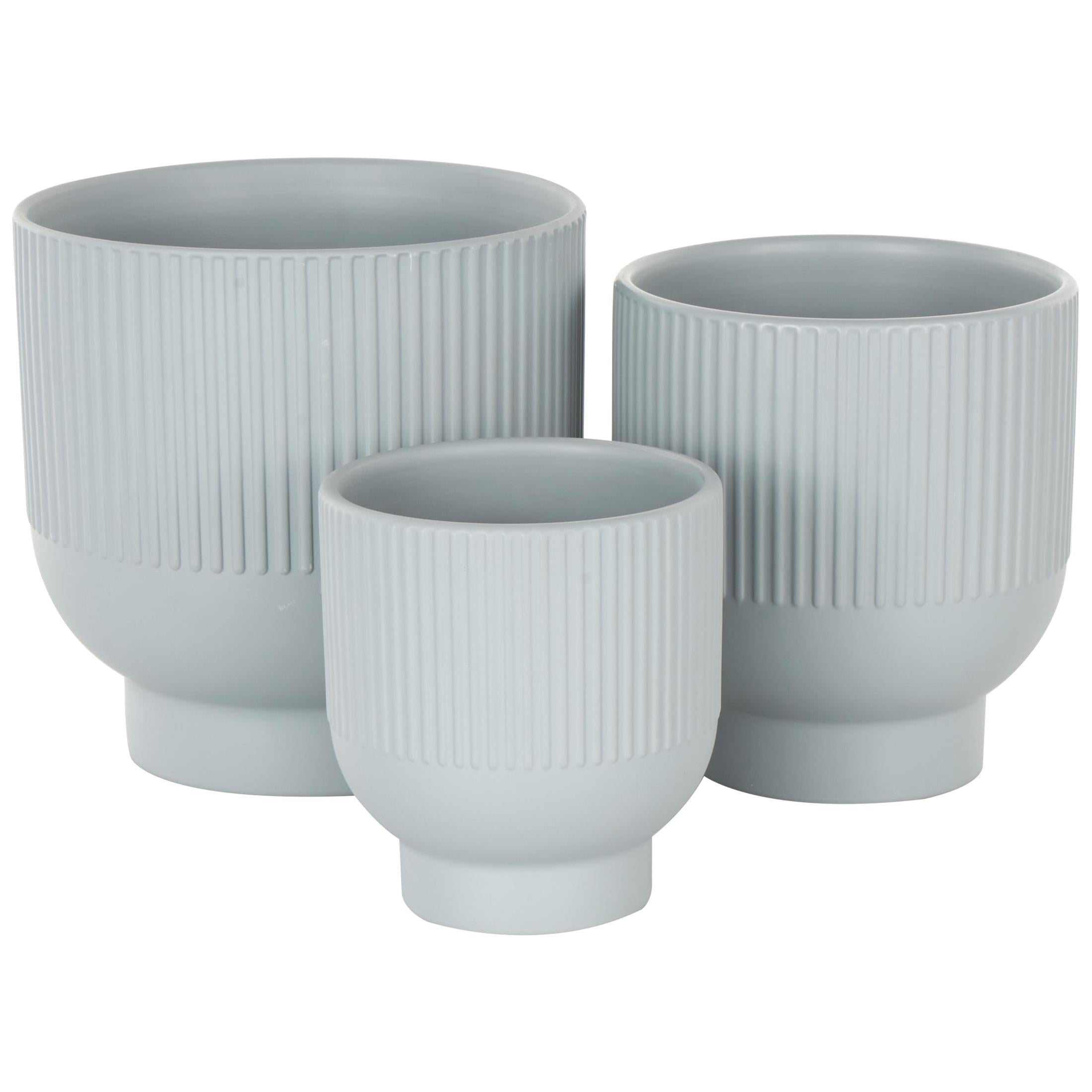 DecMode 9", 7", 5"W Light Blue Ceramic Planter with Linear Grooves and Tapered Bases (3 Count)