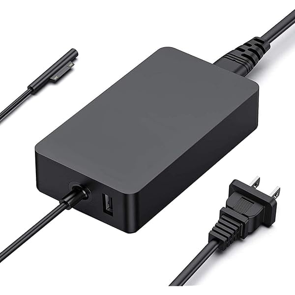 wonima11 65w surface pro charger for microsoft surface pro 9, 8, 7+, 7, 6, 5, 4, 3, x, windows surface laptop 5, 4, 3, 2, 1, surface go tablet, surface book 3, 2, 1, support 44w, 36w Adaptador de corriente rectangular negro, vista en 3/4 con conector magnético Surface, cable con clavija plegable tipo A y puerto USB-A lateral; acabado mate, cable fijo y fondo blanco. Suele usarse también como cargador secundario para viajes.