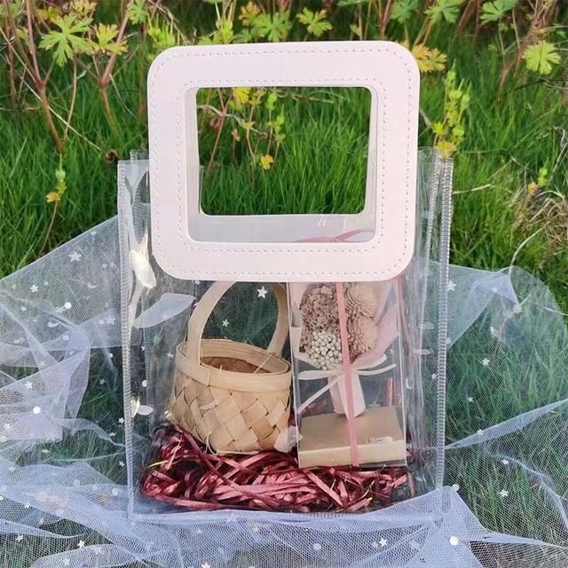 Bolsa de regalo navideña Bolsa de plástico PVC Bolsa de regalo de acompañamiento Bolsa de láser Bolsa transparente Bolsa de regalo navideña para llevar en la mano