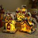 thumbnail image 3 of Casas de pueblo navideñas de invierno, adorno de resina en miniatura con iluminación LED, decoración de mesa de pueblo para fiestas navideñas, 3,54 x 3,15 x 4,72 pulgadas, 3 of 5