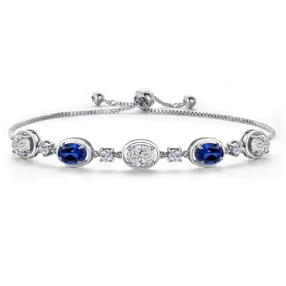 Gem Stone King 925 Sterling Silver White Lab Grown Diamond and Blue Created Sapphire Bracelet for Women | 4.10 Cttw | Gemstone April Birthstone | Oval 7X5MM | Fully Adjustable 9 inch