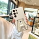 thumbnail image 4 of Manténgase a la moda y seguro con esta innovadora y protectora funda de teléfono de goma TPU a prueba de golpes con diseño de dibujos animados para iPhone, 4 of 4