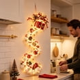 thumbnail image 2 of Festive Lighted Christmas Wall Decoration with a Red Gift Box with a Gold Bow, Cascading LED Hanging Pendant for the Hallway, Doorway and Staircase Wall Decor (Scarlet Gold), 2 of 5