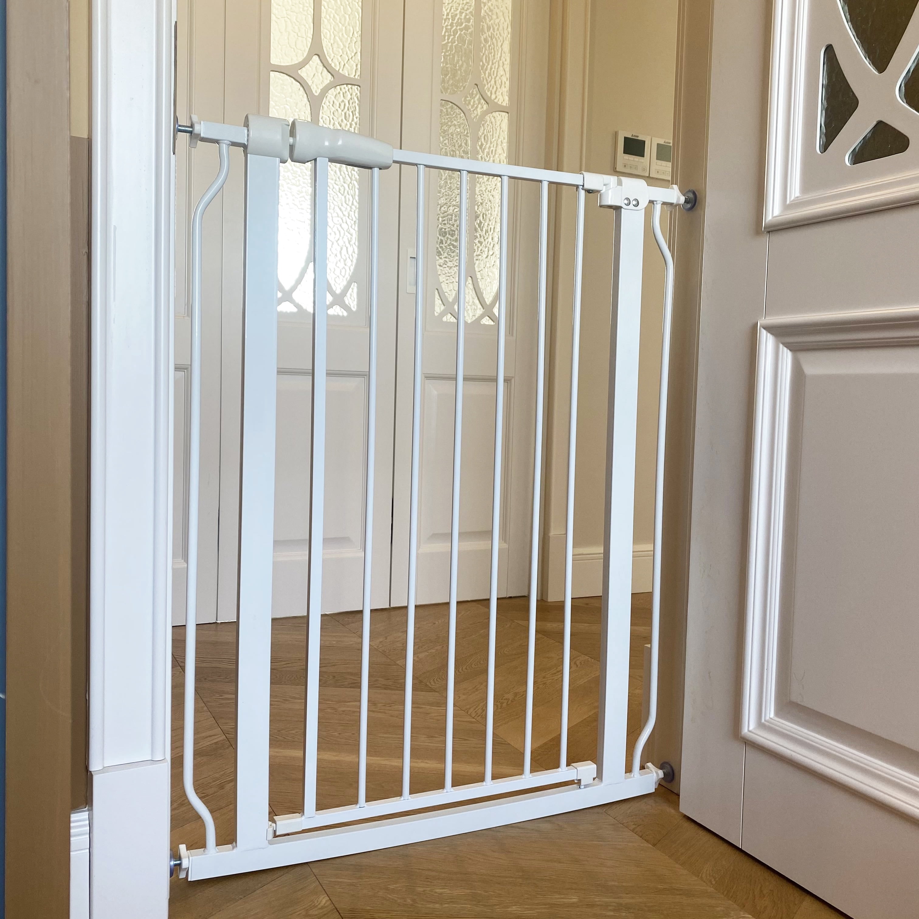 Elevon Easy Walk Through Safety Gate for Doorways and Stairways with Auto Close and Hold Open Features with Wall Caps, Fits Opening Between 29.1 to 33.8 Inches, 36-Inch High
