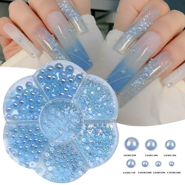 Perlas semicirculares de base plana en una caja de perlas de esmalte de uñas de colores, accesorios para uñas DIY, perlas de resina, perlas para uñas.