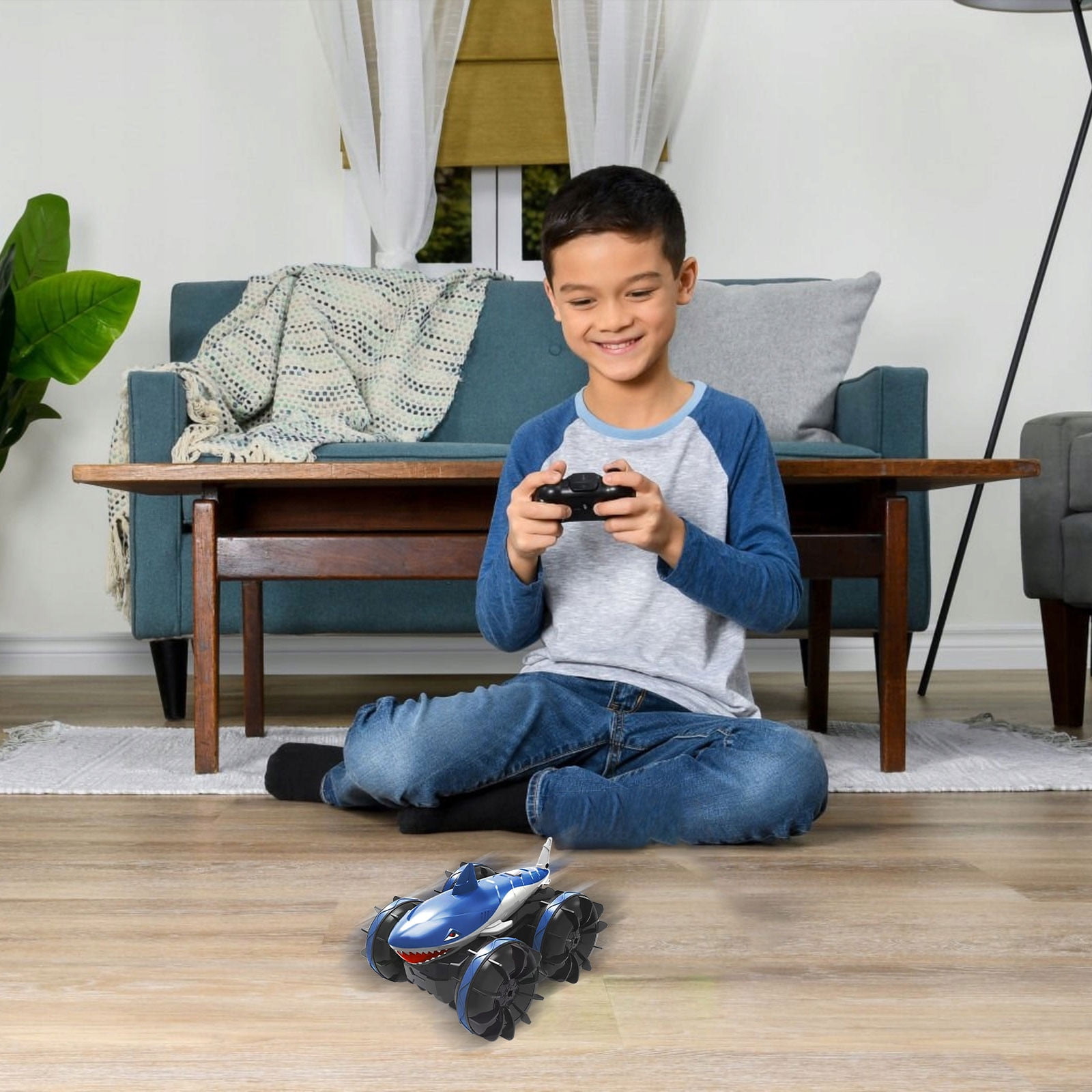 Blue Rc Stunt Car That Runs On Both Terrain And Water With Rechargeable Battery And Rubber Tires