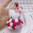 thumbnail image 1 of Sanrio-Llavero de felpa con Bola de Pelo de Hello Kitty, colgante de cinta de perlas, accesorios Kawaii para niñas, figuras de Anime, regalo para niños, 1 of 5
