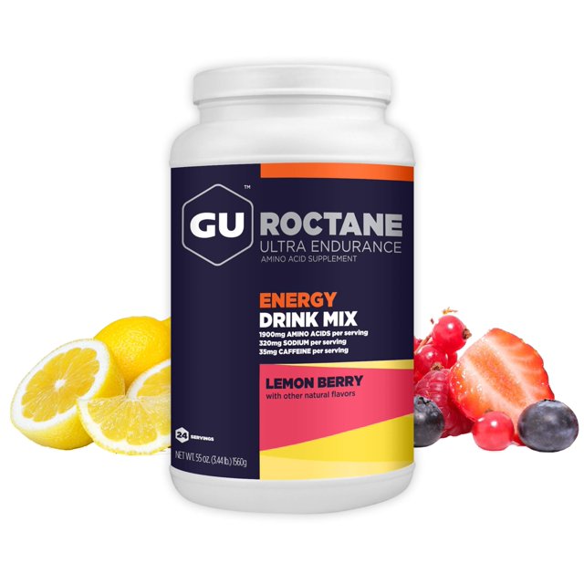 mezcla de bebidas energéticas gu energy roctane ultra endurance 1,56 kg frasco frontal blanco con etiqueta azul marino y logo GU, texto 'Roctane Ultra Endurance' y 'Energy Drink Mix', banda amarilla/rosa que indica sabor Lemon Berry; rodajas de limón y bayas al costado; especificado como vegano, sin gluten y sin lácteos en la ficha técnica; se mezcla en 21 oz (625 ml) de agua. También suele usarse para reponer carbohidratos durante sesiones largas de entrenamiento.