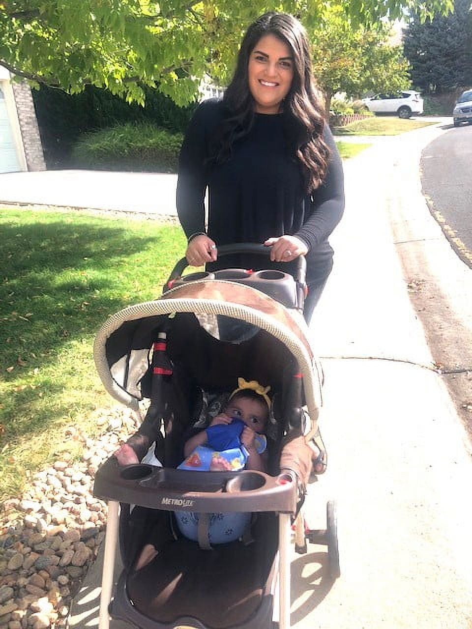 The Bottle Bib-Lullaby Collection Pink Keeps baby bottles, food pouches and training cups, from falling onto dirty surfaces!  Hands free Feeding! Check it out!
