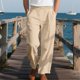 thumbnail image 1 of Pantalones largos casuales de poliéster para hombre, color sólido, cintura elástica, cordón ajustable, pierna ancha, bolsillos, para playa, 1 of 8