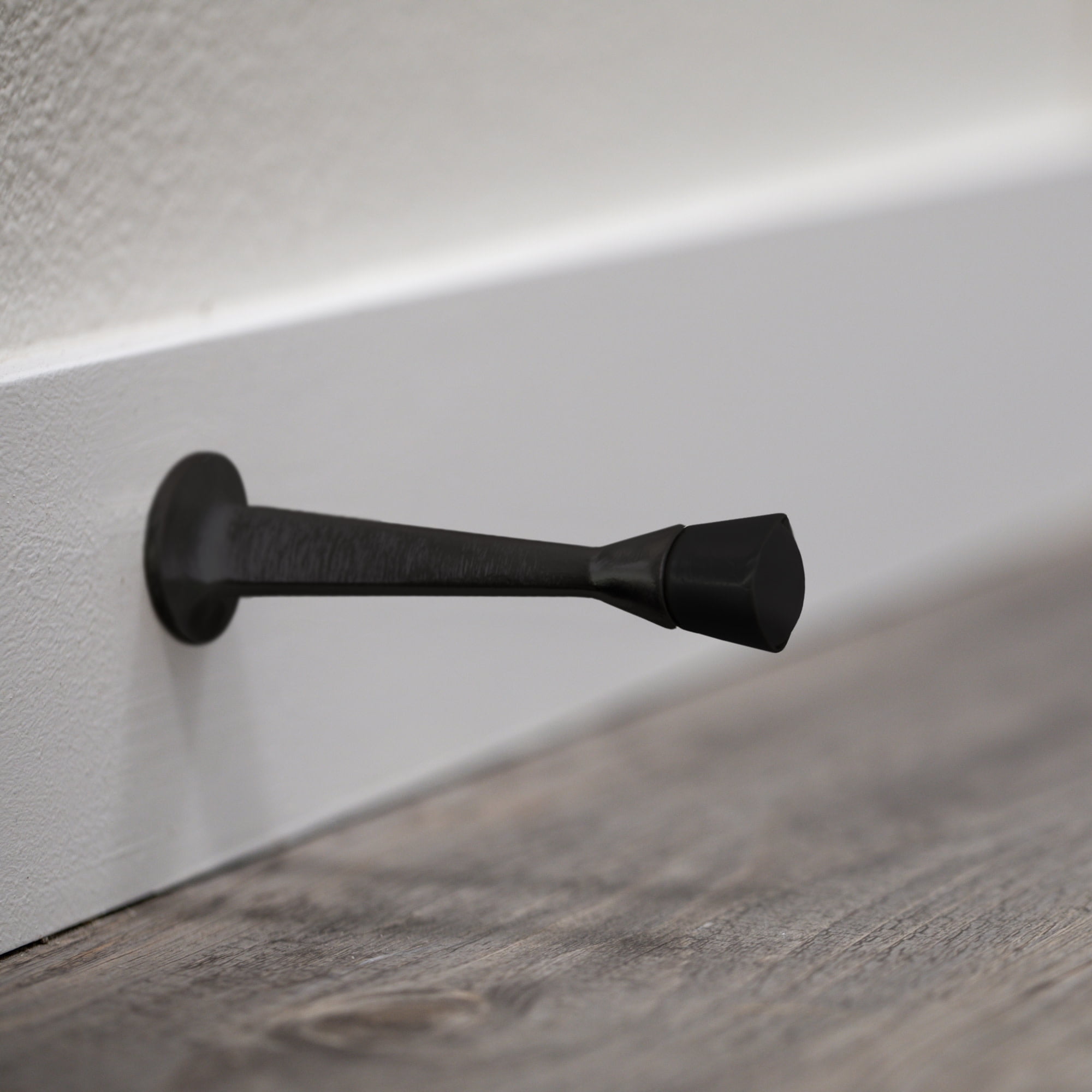Design House 10-Pack Solid Steel Door Stops with Soft Rubber Tip, Matte Black