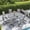 Gray Table- Gray Chairs, variant on VOXBIN Patio Dining Set for 8 Outdoor Furniture Includes 63.1" Round Table and Swivel Chairs, Sandshell Color Tabletop and Fabric
