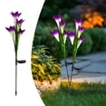 thumbnail image 1 of Luces de suelo de flor de lirio solar, paquete de 2 lámparas decorativas de jardín al aire libre, luces de estaca LED impermeables de 27.56 ", decoración de patio multicolor con energía solar, 1 of 6