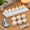 Rechargeable White Marble Pattern-12, variant on Rechargeable White Marble Pattern 12-Pack LED Tea Lights with Remote and Charging Station