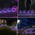 thumbnail image 7 of Solar Halloween Decorations Outdoor, 8 Pack Spooky Skulls Solar Torch Flame Lights, Waterproof Pathway Halloween Lights for Garden, Yard, Lawn, Porch, Landscape Decor, Purple, 7 of 7