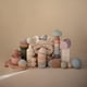 thumbnail image 3 of Juguete de barcos de baño apilables Mushie (pétalo) | Juguetes flotantes para bañera para bebés y niños pequeños, juego de 5 | Hecho en Dinamarca, 3 of 5