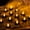 d- Black Base, Warm White Light, variant on XIHAMA Color Changing LED Tea Lights Bulk, 24 Pcs Flameless Tealight Candles with Colorful Lights, Battery Operated Colored Fake Candles, No Flickering Light, [White Base]