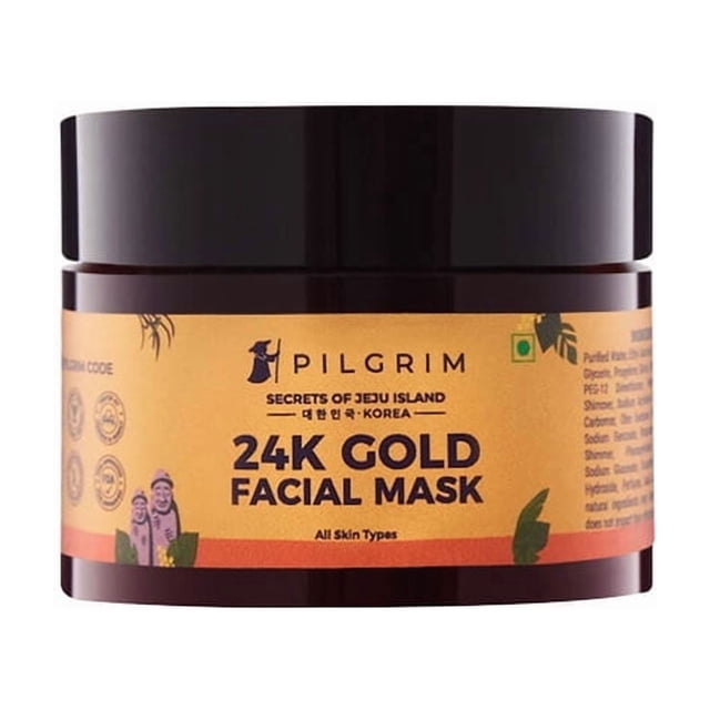 Pilgrim Masque Facial en Or 24K dans un Pot de 50 g, Présentant un Contenant Brun Foncé avec une Étiquette Dorée. l'Étiquette Met en Valeur le Nom du Produit, « Masque Facial en Or 24K », et Mentionne Sa Convenance pour Tous les types de Peau. Conçu comme un Rituel Beauté Pré-Événement, Ce Masque Facial à Enlever Contient des Particules Dorées pour Illuminer et Raffermir la Peau, avec un Extrait de Feuille d'Olivier pour l'Hydratation et une protection Antioxydante.