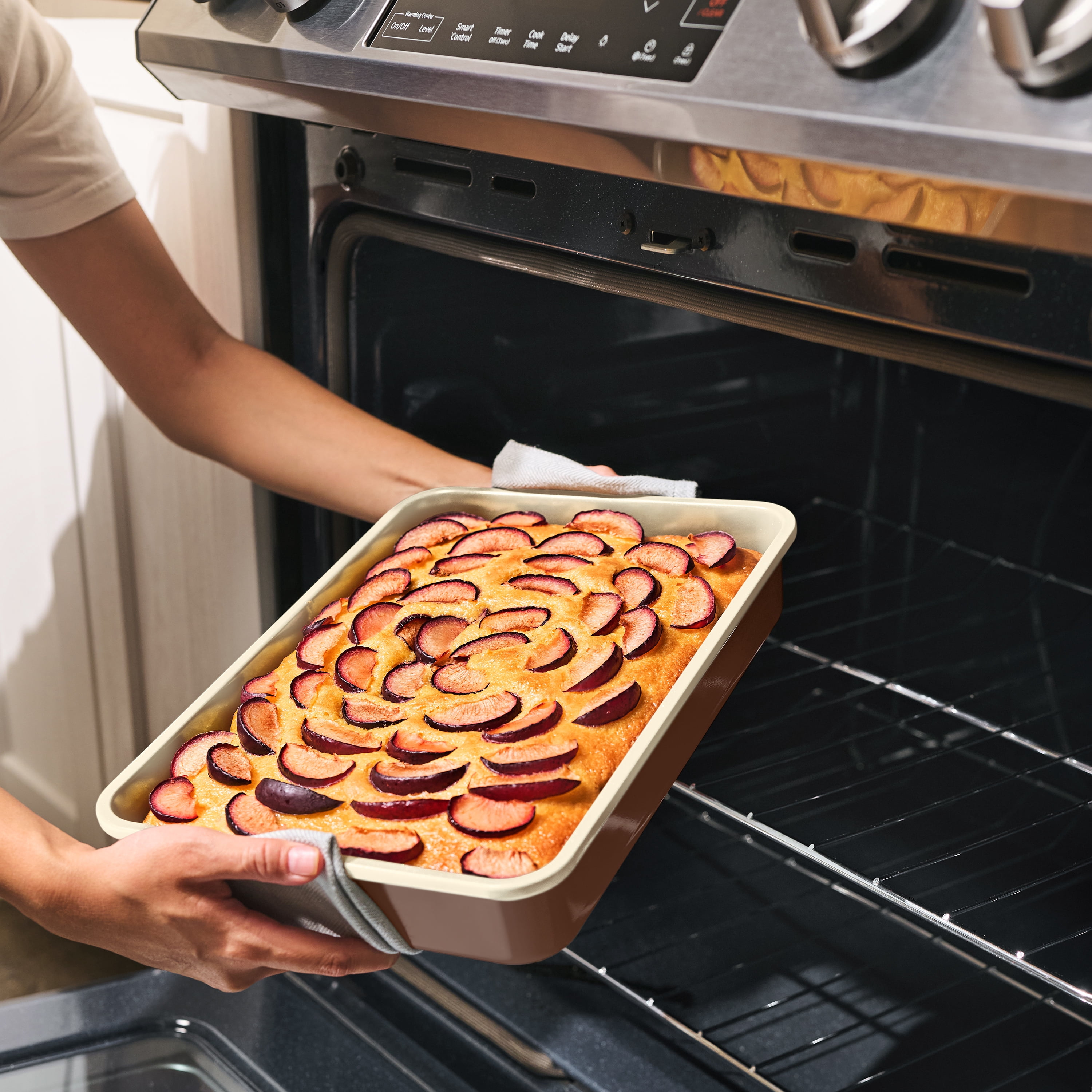 Beautiful 3-Piece Nonstick Metal Bakeware Set with Baking Sheet, 9" x 13" Cake Pan & Cooling Rack, Chocolate Brown by Drew Barrymore